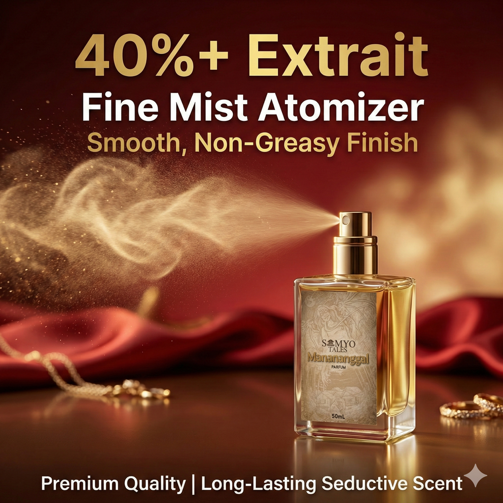Perfume bottle with mist being sprayed, red fabric and jewelry in the background