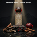 Perfume bottle with 'Bernardo Carpio' branding, surrounded by cinnamon sticks and an apple on a dark background.
